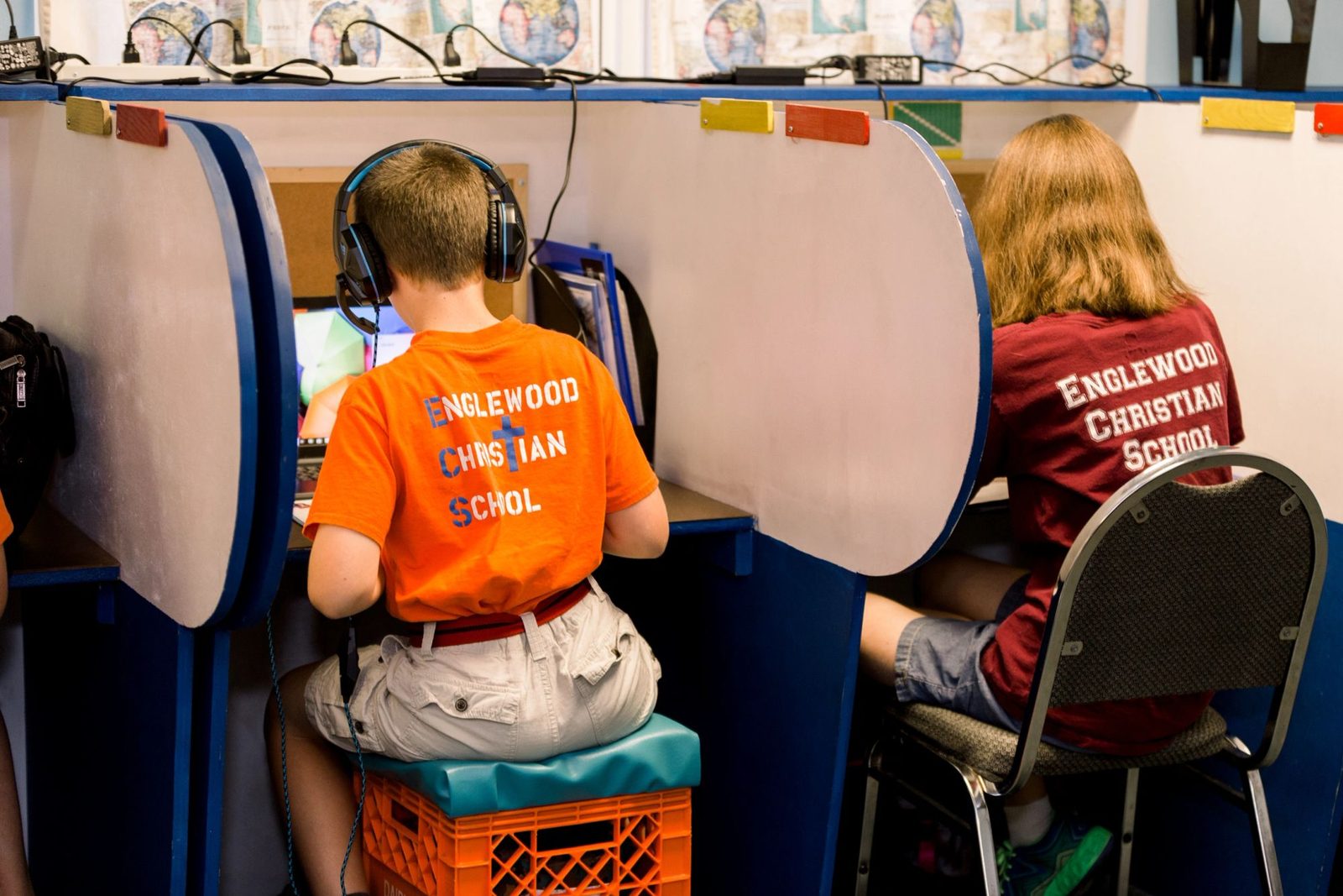 Students using computers with headphones